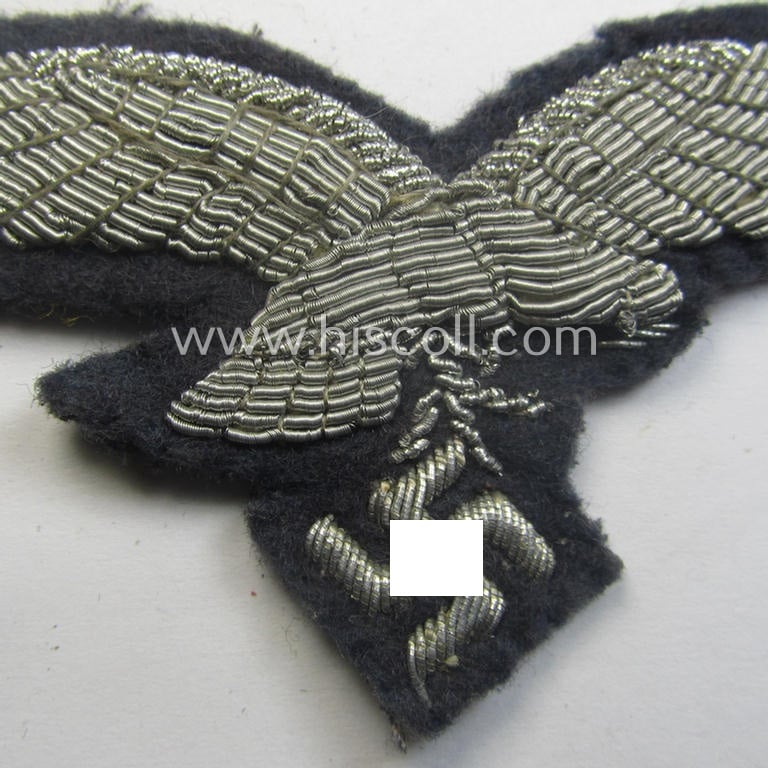 WH (Luftwaffe) officers'-pattern breast-eagle (ie. 'Brustadler für Offiziere der Luftwaffe') being a neatly hand-embroidered example of the: 'Extra Qualität' that comes in a moderately used- (ie. carefully tunic-removed-), condition