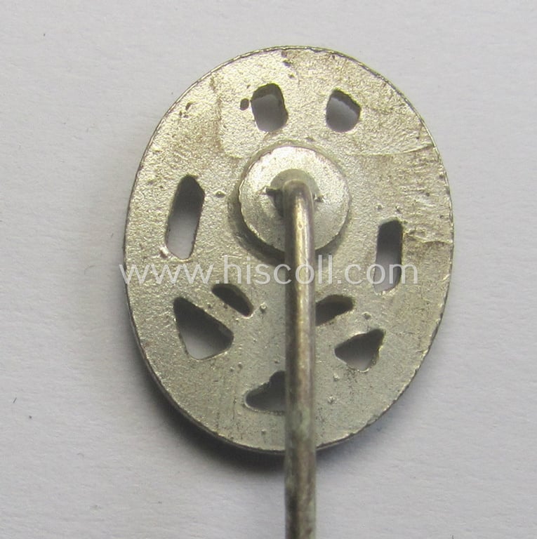Miniature-lapel-pin depicting an: 'Allgemeines-Sturmabzeichen' (or: general-assault-badge ie. GAB) being a non-maker-marked example as executed in silver-coloured zinc-based metal (ie. 'Feinzink')