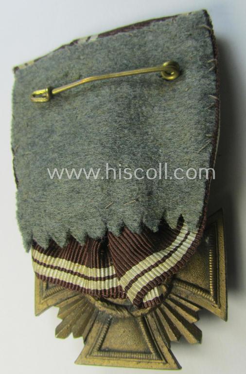 'N.S.D.A.P. DA in Bronze' (ie. '3. Stufe für 10 Jahre t.D.') being a 'regular-weight'-pattern, zinc- (ie. 'Feinzink'-) based example that comes mounted as a so-called: 'Einzelspange'