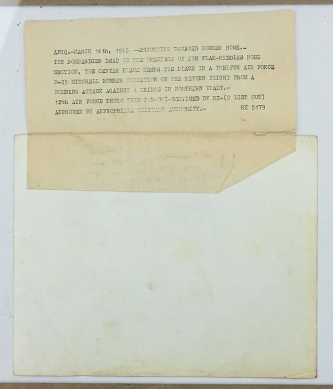 US WW2 Press Photo 'Flak damaged Bomber'