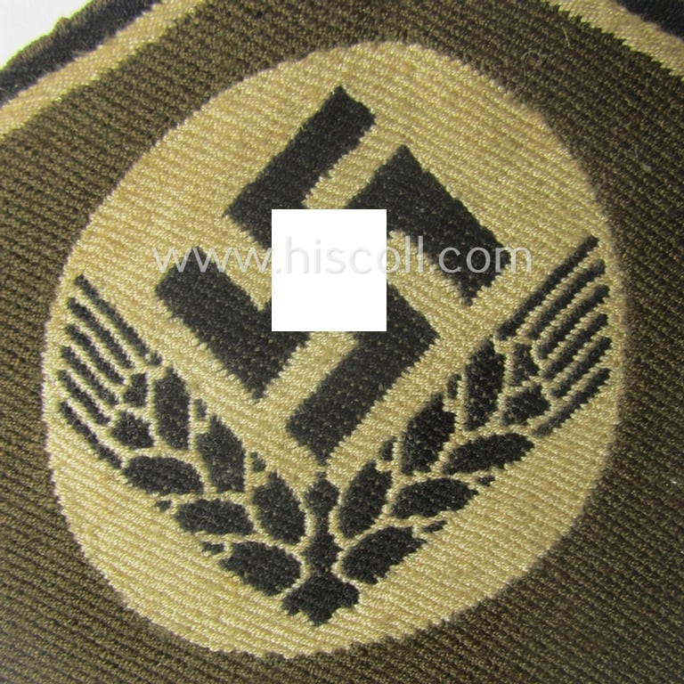 Female-related, enlisted- (ie. NCO-) pattern-, so-called: 'RADwJ'-sleeve-badge (ie. 'Abzeichen des Reichsarbeitsdienst der weiblichen Jugend') being a clearly worn example as executed in the neat 'BeVo'-weave-pattern