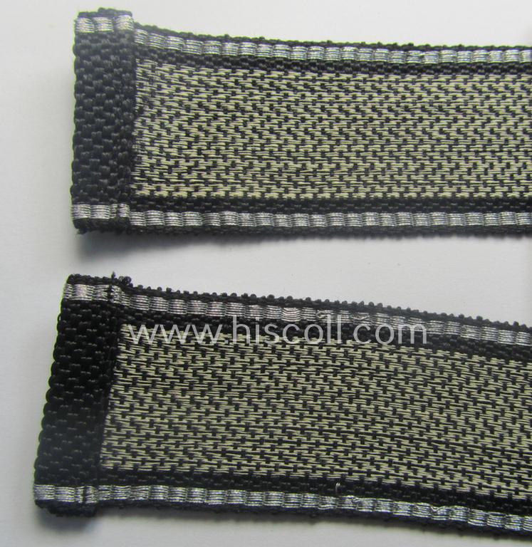 Stunning, Waffen-SS officers-type, 1939/40-pattern cuff-title (ie. 'Ärmelstreifen') as executed in flat-wire 'BeVo'-weave-pattern (in Gothic-styled script!) for an officer who served within the: SS-Rgt. 'Deutschland' (2. SS-Pz-Div. "Das Reich...