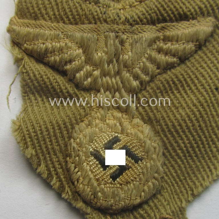 Unusually 'cut-out', early-pattern, HJ (ie. Hitlerjugend) beige- (ie. tan-) coloured, 'M34'-pattern side-cap-eagle (ie. 'Adler fürs Schiffchen o. Sommermütze nach Vorschrift der RJF') being a moderately used example