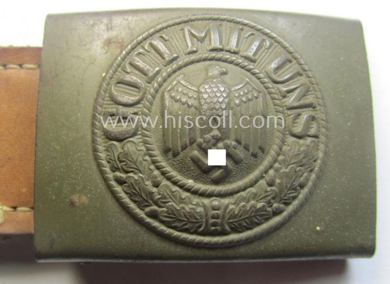 Minimally used, WH (Heeres) field-grey-coloured- and/or steel-based belt-buckle being a (typical) non-maker-marked example that comes mounted onto its maker- (ie. 'C.W. Motz'-) marked and/or '1941'-dated leather-based tab