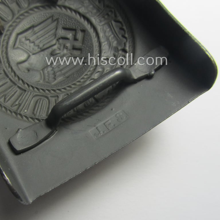 WH (Heeres) bluish-grey-coloured- and/or steel-based belt-buckle being a maker- (ie. 'JFS' or: 'Josef Feix & Söhne'-) marked example that comes in a virtually 'mint- ie. unissued-', condition