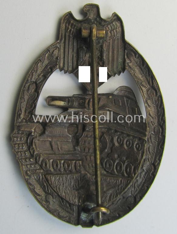 Superb - and actually scarcely encountered! - example of a: 'Panzerkampf-Abzeichen in Bronze' being a typical 'hollow-back', non-maker-marked- (and/or: 'Buntmetall'- ie. 'Tombak'-) based example as was procuced by the: 'Karl Würster'-compan...