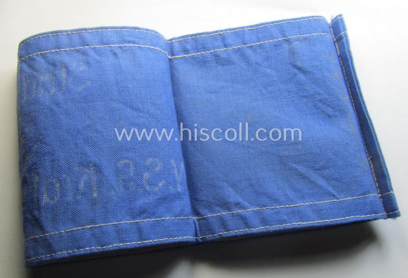 Unusually seen, linnen-based- and/or light-blue-coloured, DAF- (ie. KDF-) related armband (ie. 'Armbinde') showing white-linnen-toned borders and depicting the typical 'KDF'-logo and text: 'Stadtführer - N.S.G. Kraft durch Freude'