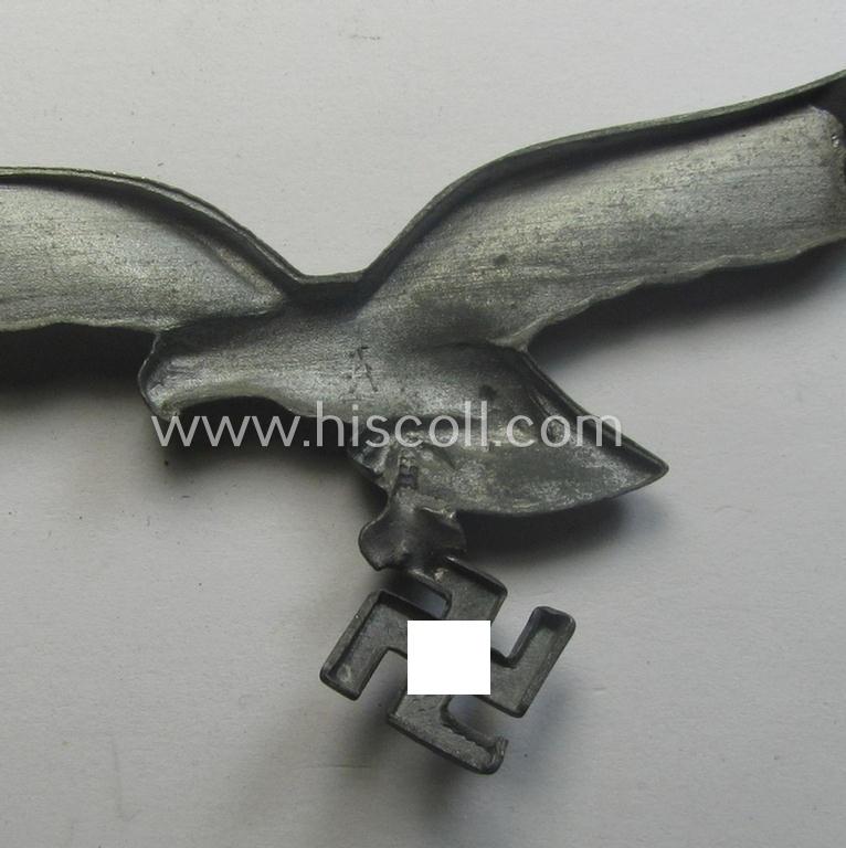 WH (Luftwaffe) zinc- (ie. 'Feinzink'-) based breast-eagle as was specifically intended for usage on the white summer-tunics (ie. 'Brustadler für Sommerrock') being a detailed- and maker- (ie. 'A'-) marked specimen