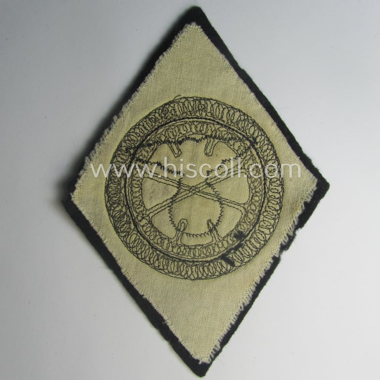 Unusual 'variant'-pattern, larger-sized sports'-shirt patch for officials serving within the within the: N.S.K.K. (ie. 'National Socialistisches Kraftfahr Korps') that is executed in detailed machine-embroidery