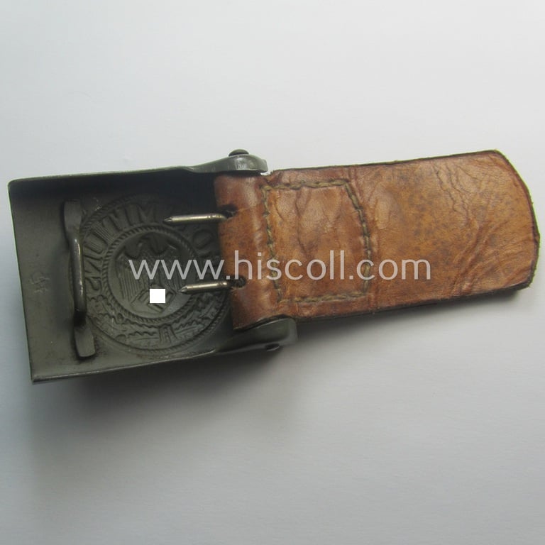Superb - and 'virtually mint'! - WH (Heeres) field-grey-toned- and steel-based belt-buckle being a maker- (ie. 'H.A. 42'-) marked example that comes mounted onto its: 'H. Arld - Nürnberg'-marked and/or: '1942'-dated tab