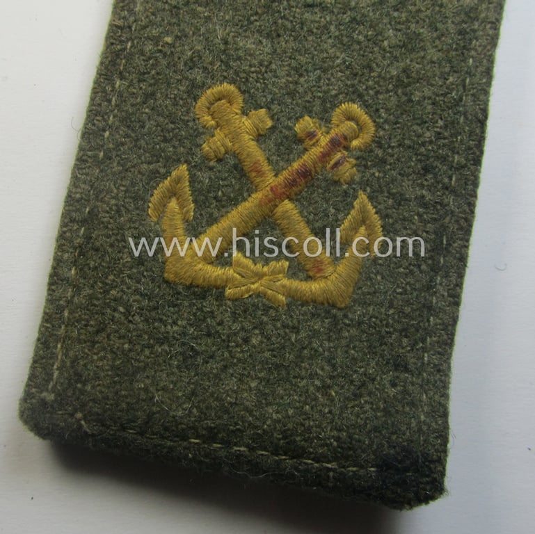 Single, 'cyphered' (and I deem early- ie. mid-war-period), WH (KM) EM-type shoulderstrap: 'Soldat eines Küsten-Artillerie-Abtlgs.'