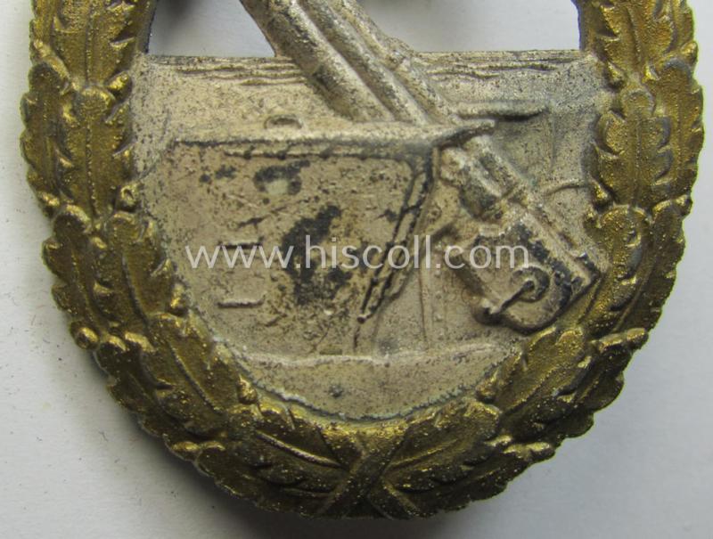 WH (KM) 'Marine-Artillerie-Abzeichen' being a maker- (ie. 'F.L.L. - 43'-) marked- and/or zinc- (ie. 'Feinzink'-) based example by the: 'Friedrich Linden'-company