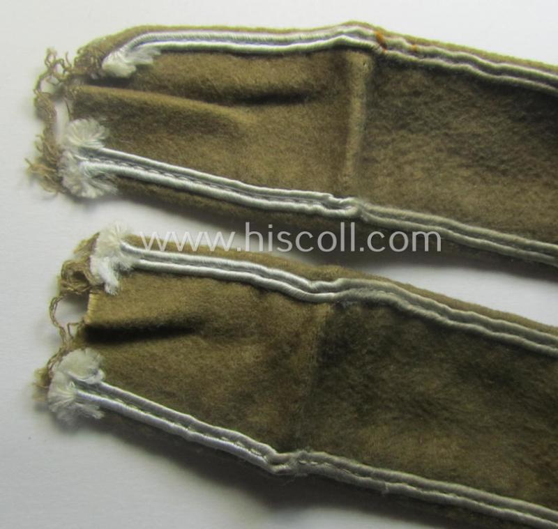 Moderately used, WH cuff-title (ie. 'Ärmelstreifen') entitled: 'Afrika' (being a hardly shortened example that comes in an overall very nice- (ie. issued and clearly worn ie. once tunic-attached-), condition