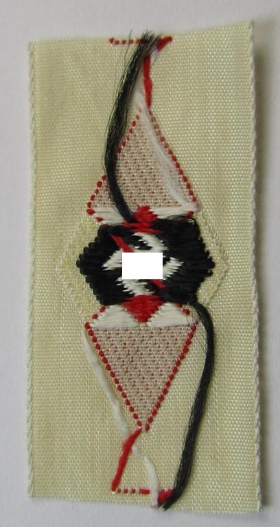 Neat, HJ (ie. 'Hitlerjugend') cap-badge (ie.: 'Raute') being a bright-red-coloured- and/or detailed example that is executed in the neat 'BeVo'-weave-pattern