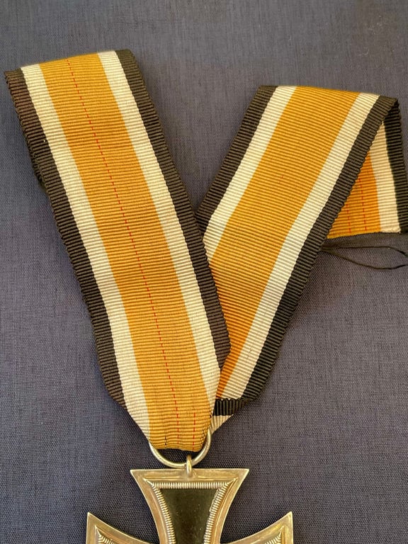 RARE WWII IRON CROSS 2RD CLASS RING STAMPED 4, STEINHAUER & LUCK OF LUDENSCHHELD WITH ORANGE RIBBON.