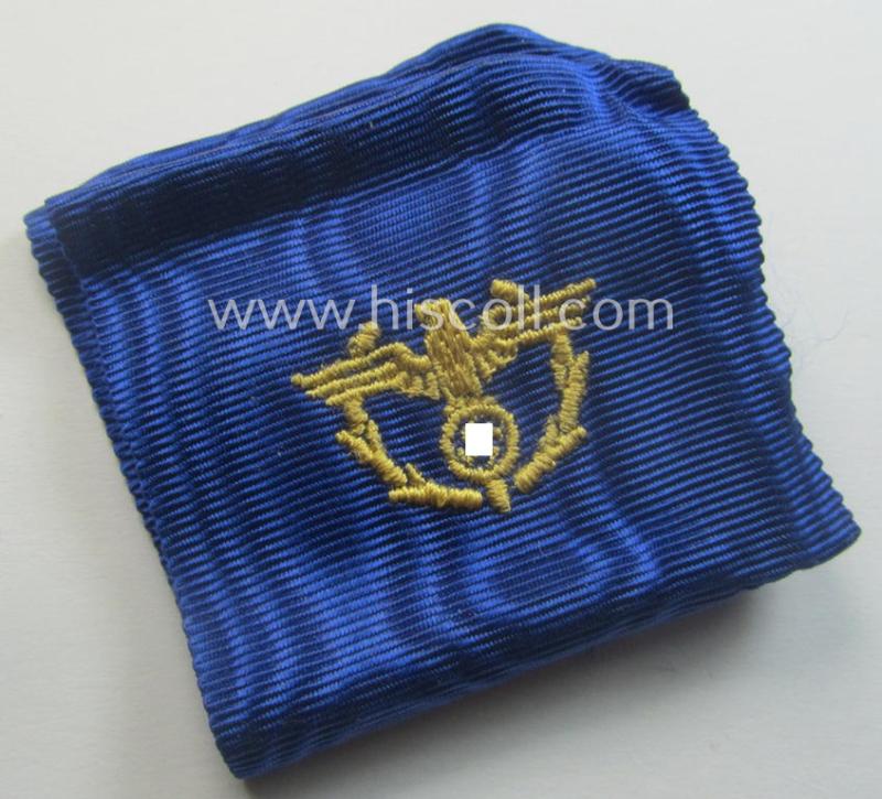 'Zollgrenzschütz-Ehrenzeichen' (or: customs loyal-service medal) that comes together with its full-length ribbon (ie. 'Bandabschnitt') and that comes stored in its (incomplete) etui