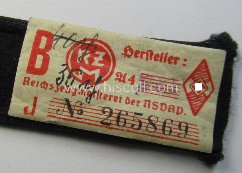 Neat - and naturally single! - black-piped 'DJ- o. Deutsches Jungvolk' shoulderstrap as was intended for usage by a: 'DJ-Mitglied' who served within the: 'Bann 310' (310 = 'Donau') and that comes with its period-attached 'RzM'-etiket