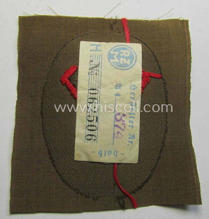 Attractive, SA (ie. 'Sturmabteilungen') armbadge as executed in the neat 'BeVo'-weave pattern and retaining its RzM-etiket as was specifically intended for usage by an: 'Sanitäts-Unterführer o. Mann' (ie. 'SA-Feldscher')