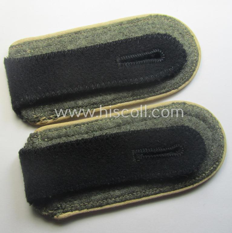 Stunning pair of Waffen-SS NCO-type shoulderstraps as piped in the white-coloured branchcolour as was intended for usage by an: 'SS-Unterscharführer' who served within the: 'Waffen-SS Infanterie-Trpn.'