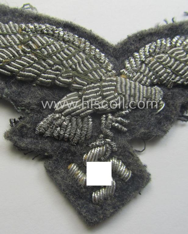 WH (Luftwaffe) officers'-pattern visor-cap-eagle (ie. 'Adler für LW-Offiziers-Schirmmütze') being a neatly hand-embroidered example of the: 'Extra Qualität' that comes in a moderately used- (ie. carefully cap-removed-), condition
