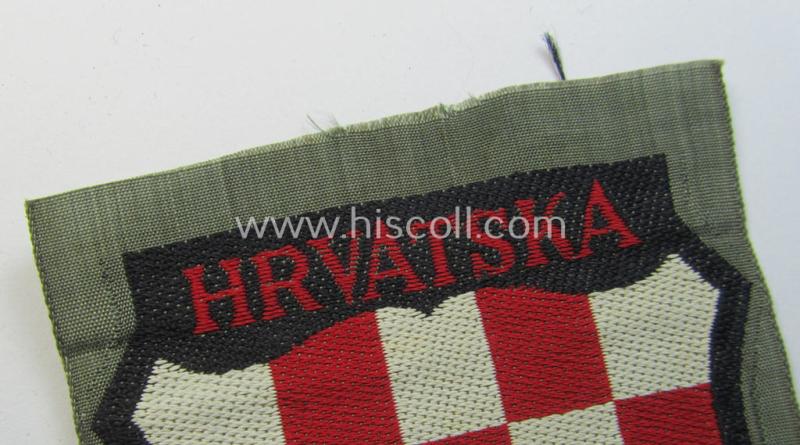 Superb, multi-coloured- and/or 'BeVo'-woven armshield (ie. 'Ärmelschild') entitled: 'Hrvatska' as was intended for usage by a volunteer who served within the 'Deutsche Wehrmacht' ie. within the 'Kroatische Legion'