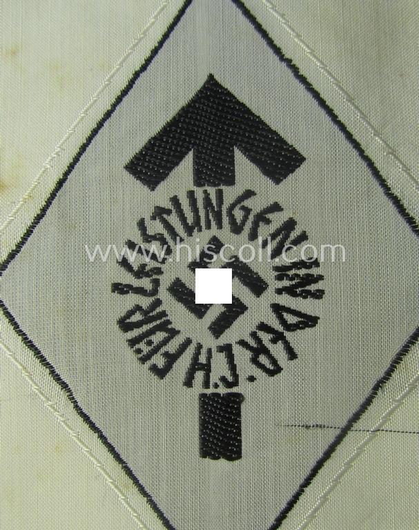 HJ- (ie. 'Hitlerjugend') 'Leistungsabzeichen in Schwarz in Stoff' that retains its 'RzM'-etiket
