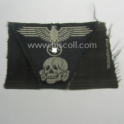 Truly used and worn, Waffen-SS black-coloured 'M43'-pattern 'Panzer'-cap-trapezoid...