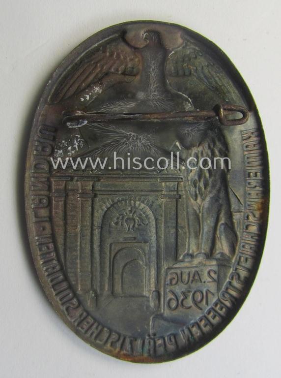 Commemorative, golden-bronze-toned and/or tin-based: 'N.S.K.O.V.'- (ie. veteran-) related 'tinnie' being a non-maker-marked example showing the text: 'Kameradschaftstreffen Pfälzischer Soldaten - Landau - 2. Aug.1936'