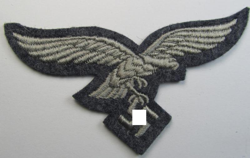Neat, 'mint- ie. unissued' example of a WH (Luftwaffe) 'standard-issue'-pattern breast-eagle (ie. 'Brustadler für Mannschaften u. Uffz. der Luftwaffe') being a machine-embroidered example as was worn throughout the war