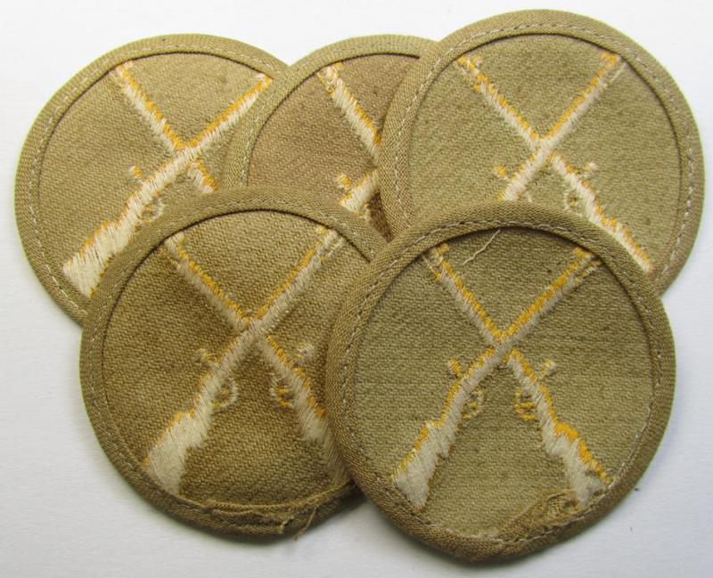 Attractive, WH (Heeres) 'tropical-style' trade- and/or special career insignia (ie. machine-embroidered speciality arm-patch) as intended for a: 'Waffenmeister' (or weapon-equipment NCO)