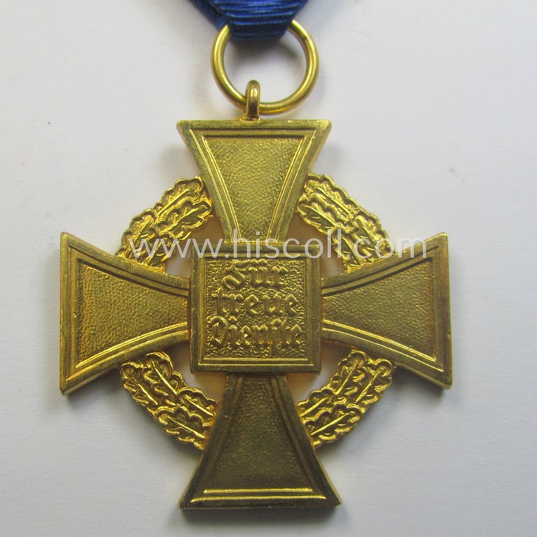 'Treuedienst Ehrenzeichen 1. Klasse' being a (typical) non-maker-marked example that came mounted onto its original ribbon (ie. 'Bandabschnitt') and that comes stored in its etui as issued