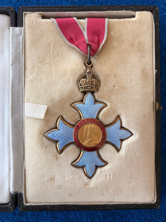 EXTREMELY RARE CASED CBE MEDAL, CASE IS TO THE LATE KING GEORGE VI ISSUE.