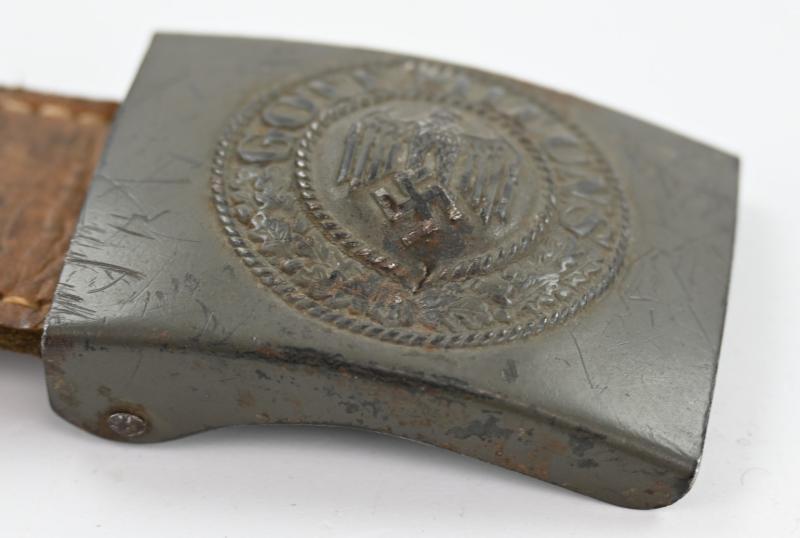 German WH Beltbuckle with Schrapnel damage and Tab 'E.Schneider'