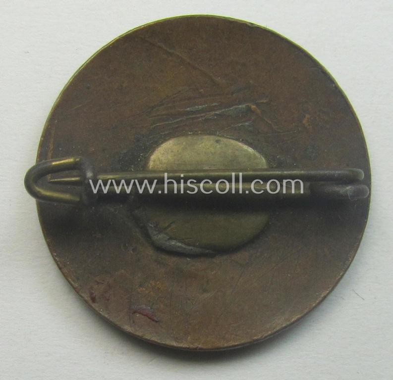 Early-pattern 'N.S.D.A.P. - Parteiabzeichen' (being a just moderately used example that is totally void of a makers'- nor-patent-pending designation)