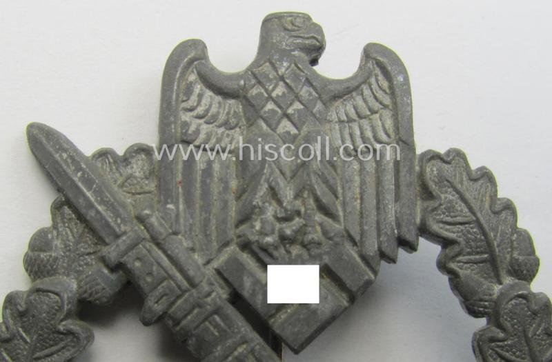 Zinc- (ie. 'Feinzink'-) based, 'Infanterie-Sturmabzeichen in Silber' (or silver IAB) being a clearly maker- (ie. 'FZZ'-) marked example