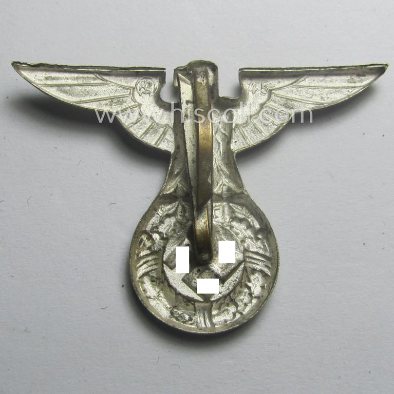 Silver-toned - and 'Buntmetall'-based - early-pattern, SS- o. SA-type, political visor- (ie. 'Schirmmützen'-) cap- (ie. 'Kepi'-) eagle being a maker- (ie. 'RzM 45'-) marked example that comes in a used- ie. carefully cap-removed, condition