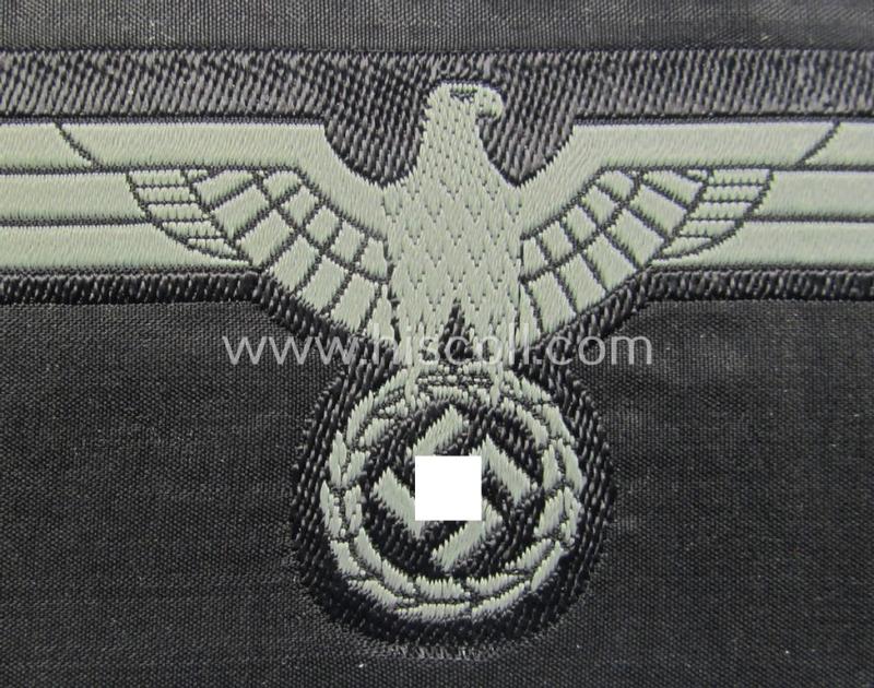 Later- (ie. mid-war-) period, WH (Heeres) 'Panzer'-type breast-eagle (ie. 'Brustadler für Panzertruppen') being a 'virtually mint- ie. unissued' example as executed in bluish-grey-coloured linnen on a black-coloured background