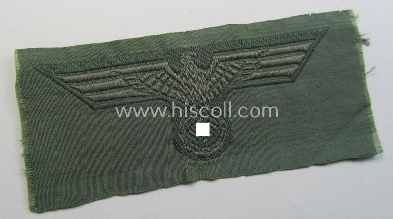 Early- (ie. mid-) war-period, WH (Heeres) cap-eagle & cocarde-set (ie. 'Schiffchenmützen-Adler u. Kokarde für Mannschaften u. Uffz.') being a 'virtually mint' set as executed in bluish-grey-coloured linnen on a field-grey-coloured background