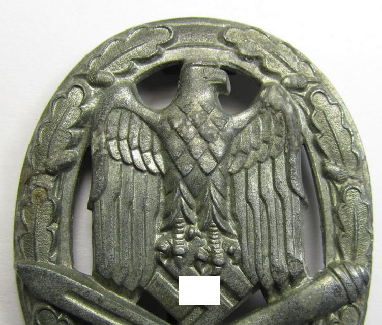 'Allgemeines Sturmabzeichen' (or: General Assault Badge ie. GAB), being an unmarked and zinc- (ie. 'Feinzink'-) based, hollow-back- (ie. so-called: 'deep-pan'-) variant-pattern as was produced by an unknown maker