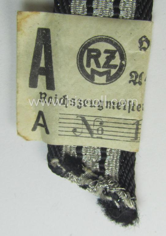 SS (ie. 'Allgemeine o. Waffen-SS') arm-insignia being an 'SS', so-called: 'Ehrenwinkel für Altgediente Kämpfer o. Angehörigen der SS' (or: honorary-chevron for old campaigners) still retaining its period 'RzM'-etiket
