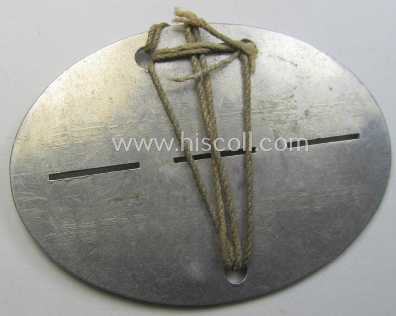 WH (Heeres) ie. 'Infanterie'-related ID-disc: 'gem.Schütz.Kp.7/306' that comes mounted onto its period cord