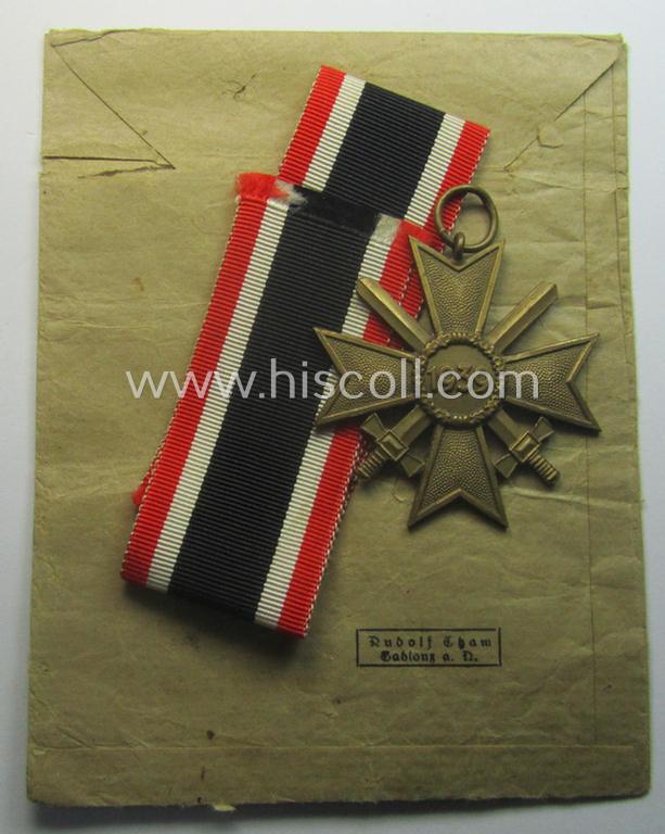 Fully matching medal-set: 'KvK 2. Klasse m. Schwn.' being a clearly maker- (ie. '101'-) marked specimen that comes in its ('variant'-pattern!) pouch by the 'Hersteller': 'Rudolf Tham - Gablonz a. N.'