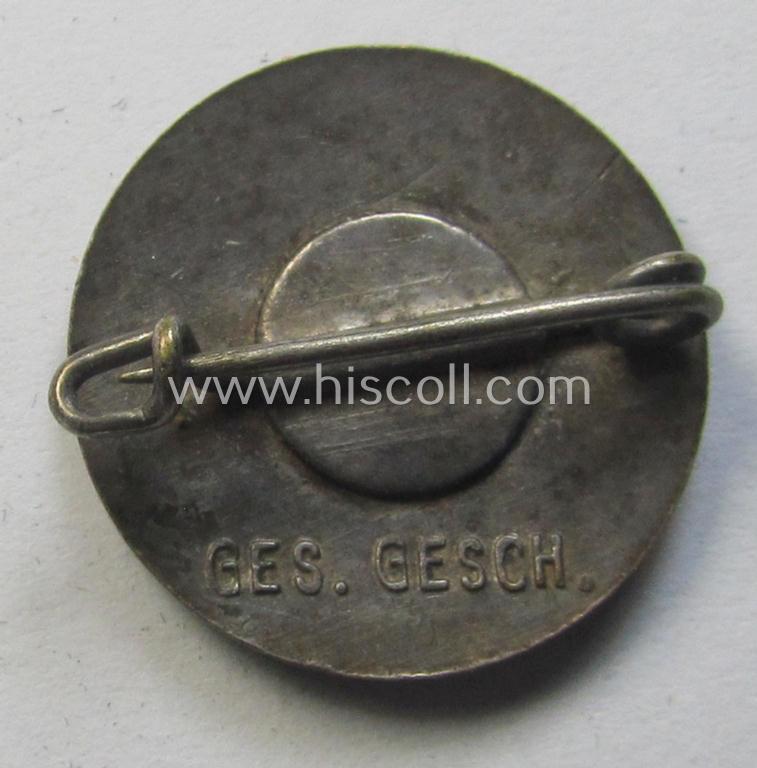 Superb - darker-red-coloured and very nicely preserved! - so-called: 'N.S.D.A.P.'-supporter-pin- ie. party-badge (or: 'Parteiabzeichen') being a smaller-sized, 'variant'-specimen that it totally void of a makers'-designation