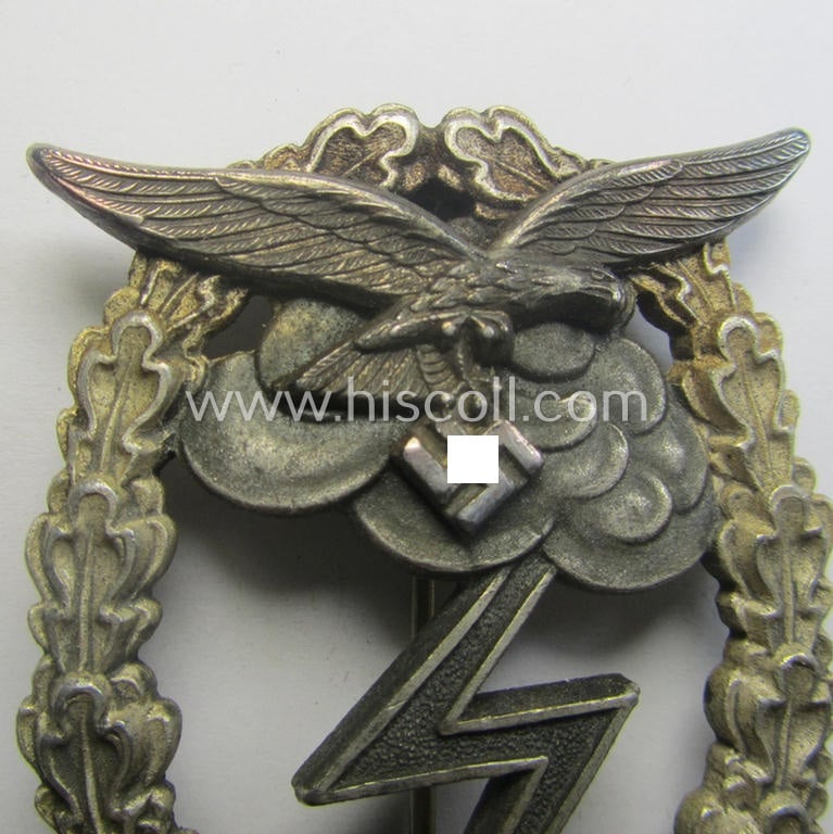 Mid- (ie. later-) war-period, zinc- (ie.'Feinzink'-) based version of a WH (Luftwaffe) 'Erdkampfabzeichen' (being a maker-marked example by the 'G.H. Osang'-company having a silvered- and 'riveted' eagle-device attached)