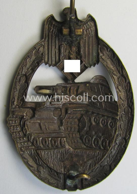 Superb - and actually scarcely encountered! - example of a: 'Panzerkampf-Abzeichen in Bronze' being a typical 'hollow-back', non-maker-marked- (and/or: 'Buntmetall'- ie. 'Tombak'-) based example as was procuced by the: 'Karl Würster'-compan...