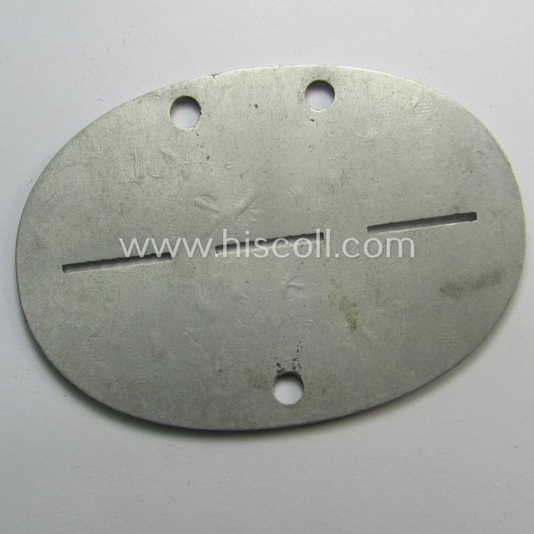 Superb - and scarcely found! - typical aluminium-based, WH (Heeres-) ie. 'Panzer'-related ID-disc (ie. 'Erkennungsmarke') bearing the clearly stamped unit-designation that reads: '3./Pz.Ers.Abt.5' and that comes as issued and/or worn