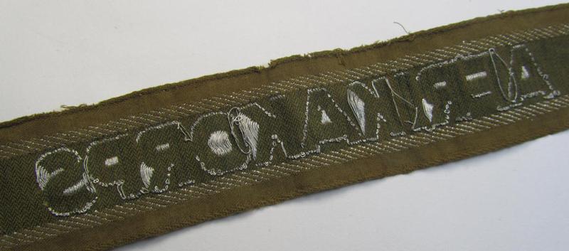 Attractive, 'BeVo'-like cuff-title (ie. 'Ärmelstreifen') entitled: 'Afrikakorps' being a with certainty issued and truly worn example that comes in an overall nice- (ie. minimally shortened- and once tunic-attached-), condition