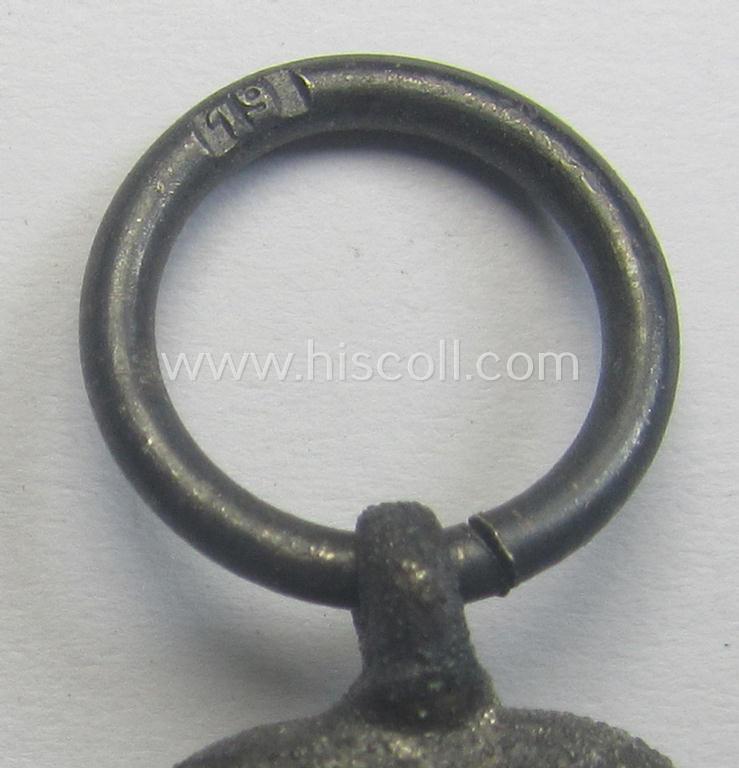 Neatly maker- (ie. '19'-) marked medal: 'Winterschlacht im Osten 1941/42' that came stored in its period pouch by the company: 'E. Ferd. Wiedmann'