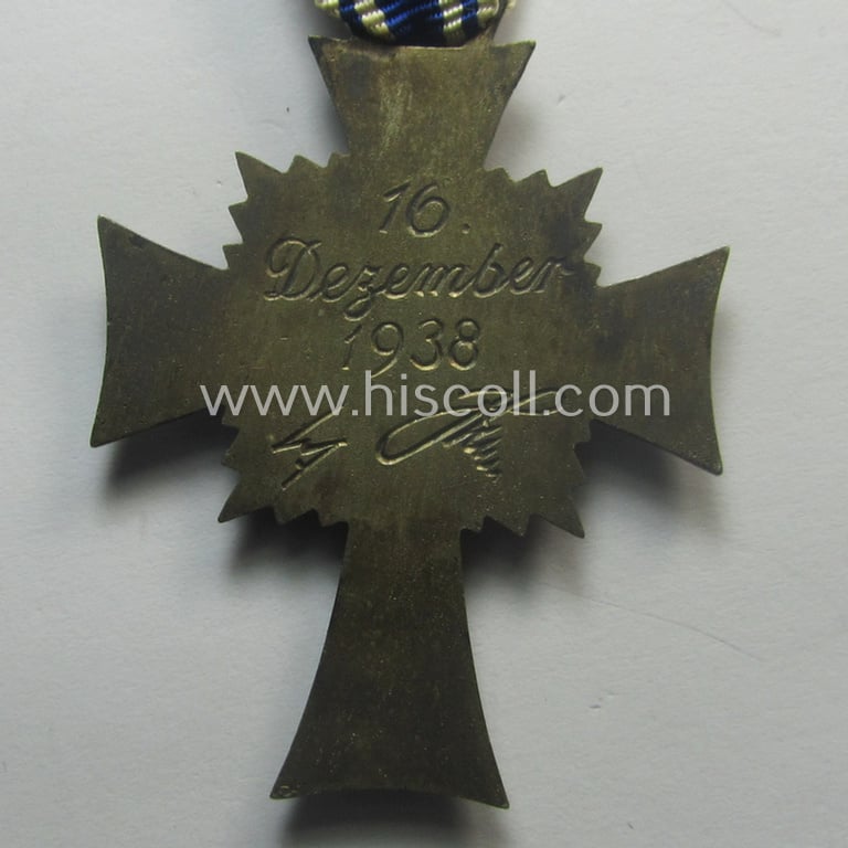 'Ehrenkreuz der deutschen Mutter - zweite Stufe' (or: silver-class mothers'-cross) that came mounted onto its long-sized ribbon and that came stored in its period pouch by the maker: 'Moriz Hausch A.-G. - Pforzheim'