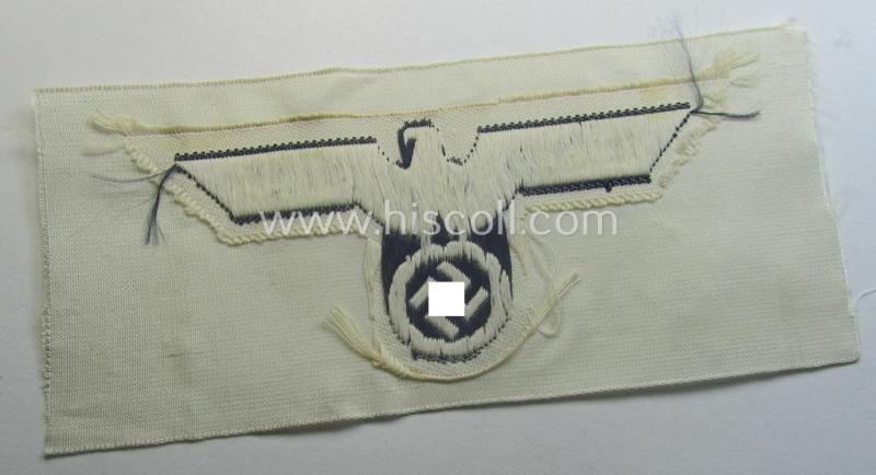 WH (KM) related breast-eagle (ie. 'Brustadler für Mannschaften u. Uffz. der Kriegsmarine') being a 'standard-issue'-pattern-example as executed in the 'BeVo'-weave-pattern on a white-coloured background